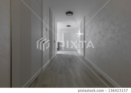 Deep perspective of a modern minimalist hallway with white flush doors Deep perspective of a modern minimalist hallway with white flush doors 136423157
