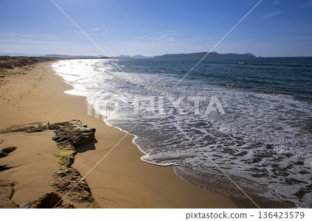 Fukuoka City: A distant view of the Gannosu Sand Dunes (Nata Coast) and Shikanoshima Island 136423579