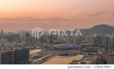 Warm sunset glow illuminates Kai Tak Sports Park Feb 8 2026 Warm sunset glow illuminates Kai Tak Sports Park Feb 8 2026 136424965
