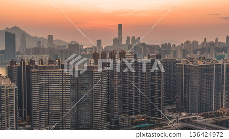 Golden sunset illuminates Kai Tak harbourfront residential skyline Feb 8 2026 Golden sunset illuminates Kai Tak harbourfront residential skyline Feb 8 2026 136424972