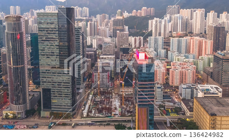 Vibrant night skyline glows brightly above Kowloon Bay Feb 8 2026 136424982