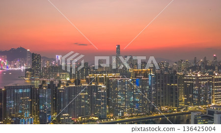 Golden sunset illuminates Kai Tak harbourfront residential skyline Feb 8 2026 136425004