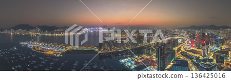 Kowloon Bay skyline glowing during early evening twilight Feb 8 2026 Kowloon Bay skyline glowing during early evening twilight Feb 8 2026 136425016