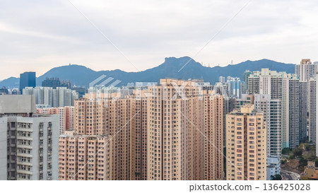 Amoy Plaza residential towers rise against distant mountain backdrop Feb 8 2026 Amoy Plaza residential towers rise against distant mountain backdrop Feb 8 2026 136425028