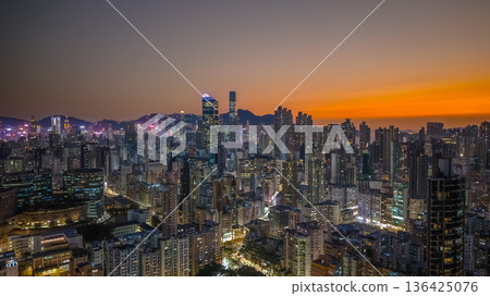 Golden sunset illuminates dense Kowloon West urban skyline Feb 6 2026 Golden sunset illuminates dense Kowloon West urban skyline Feb 6 2026 136425076