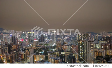 Bright night lights illuminate dense Kowloon City skyline Feb 6 2026 Bright night lights illuminate dense Kowloon City skyline Feb 6 2026 136425082