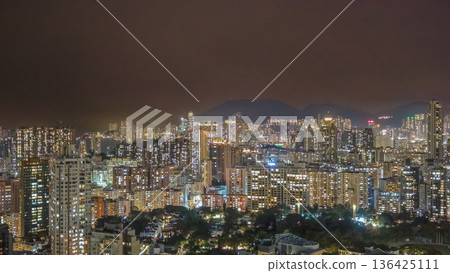 Bright night lights illuminate dense Kowloon City skyline Feb 6 2026 Bright night lights illuminate dense Kowloon City skyline Feb 6 2026 136425111