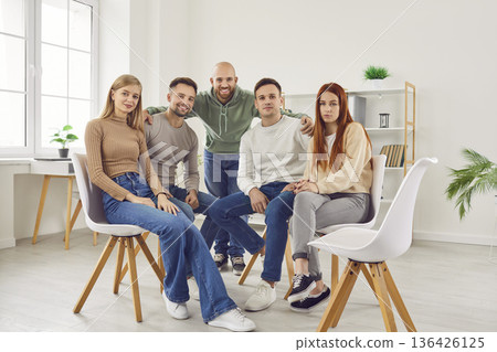 Smiling Group Portrait in Office Setting Smiling Group Portrait in Office Setting 136426125