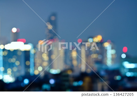 Abstract blurred background cityscape of Krung Thep Maha Nakhon (Bangkok) on night scene with multicolour bokeh from neon light on building Abstract blurred background cityscape of Krung Thep Maha Nakhon (Bangkok) on night scene with multicolour bokeh from neon light on building 136427205