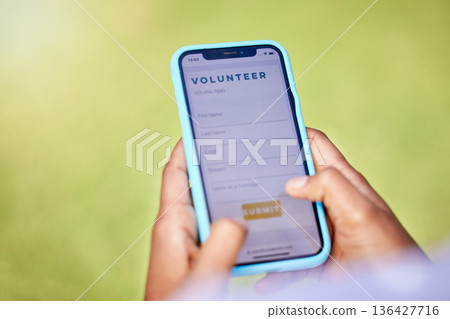 Phone screen, volunteer and hands, register online for charity and NGO with help, donation and mobile app. Internet, digital application and person sign up, info and non profit organization with care 136427716