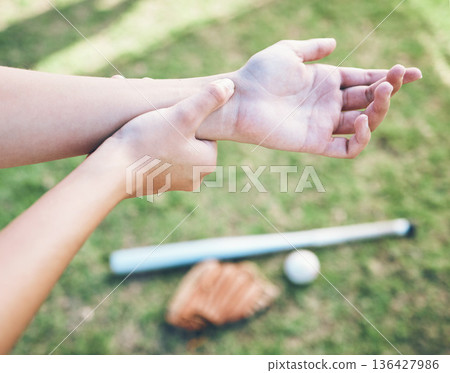 Above, field and hand pain from baseball, sports and training for a competition with an injury. Fitness, burnout and a person or athlete with a muscle accident or arm strain after a softball match 136427986