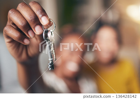 New home, hand and keys with people moving in together for real estate investment. Rent, mortgage and loan as homeowner celebrate at apartment, property or house with partner for freedom or security 136428142