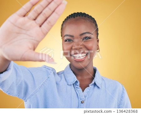 Selfie, smile and portrait of black woman in studio for motivation, social media and influencer. Happy, freedom and profile picture with face of person on yellow background for post and happiness Selfie, smile and portrait of black woman in studio for motivation, social media and influencer. Happy, freedom and profile picture with face of person on yellow background for post and happiness 136428368