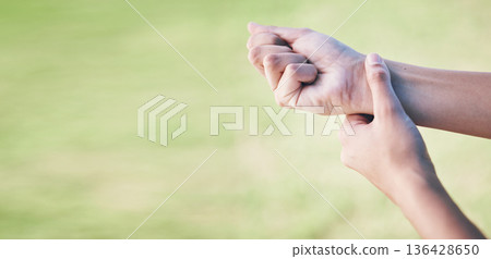 Wrist pain, sports person and hands injury from grass pitch challenge, lawn field workout or exercise problem or mistake. Medical emergency mockup, joint sprain or closeup athlete with muscle anatomy Wrist pain, sports person and hands injury from grass pitch challenge, lawn field workout or exercise problem or mistake. Medical emergency mockup, joint sprain or closeup athlete with muscle anatomy 136428650