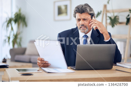 Document, laptop and businessman on a phone call in the office while talking to a client. Discussion, technology and mature professional male lawyer on mobile conversation with paperwork and computer Document, laptop and businessman on a phone call in the office while talking to a client. Discussion, technology and mature professional male lawyer on mobile conversation with paperwork and computer 136428700