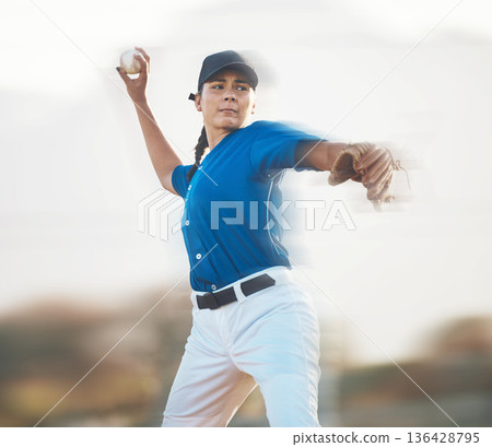 Baseball, ball and a woman pitching outdoor on a sports pitch for performance and competition. Professional athlete or softball pitcher with fitness for game, training or exercise on field or stadium Baseball, ball and a woman pitching outdoor on a sports pitch for performance and competition. Professional athlete or softball pitcher with fitness for game, training or exercise on field or stadium 136428795
