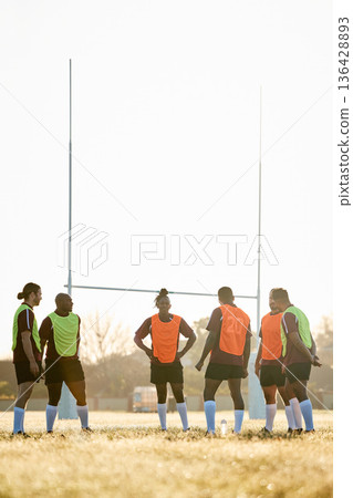 Rugby, training and men on field for motivation at game, match or practice workout together. Sports, fitness and team at poles on grass with energy, talent and inspiration for winning at challenge. 136428893