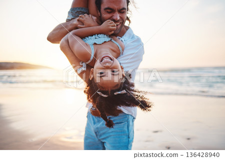 Beach, portrait and father play with girl on holiday, vacation and adventure at sunset. Happy family, summer and child laughing with dad by ocean for bonding, healthy relationship and fun outdoors Beach, portrait and father play with girl on holiday, vacation and adventure at sunset. Happy family, summer and child laughing with dad by ocean for bonding, healthy relationship and fun outdoors 136428940