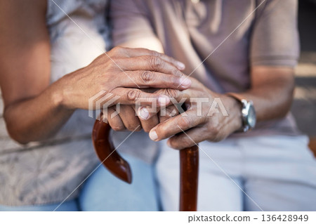 Senior couple, hands and cane in support, retirement and solidarity in marriage. Walking stick, people with a disability and man and woman in comfort, trust or love, care or empathy in house together Senior couple, hands and cane in support, retirement and solidarity in marriage. Walking stick, people with a disability and man and woman in comfort, trust or love, care or empathy in house together 136428949