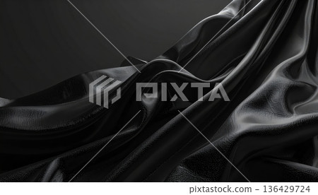 Luxurious black satin fabric features smooth rippled waves and elegant silk drapery to create a soft shiny textile background with a sophisticated velvet texture 136429724