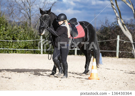 riding girl and horse riding girl and horse 136430364