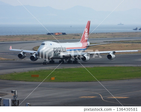 Large cargo plane taxiing departure Large cargo plane taxiing departure 136430581