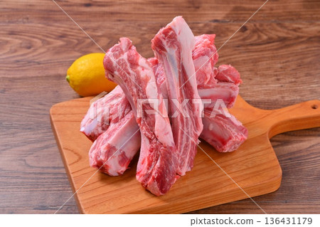 Note: This is uncooked raw meat and meat products. Pork spare ribs, pork belly on the bone, and BBQ meat. Note: This is uncooked raw meat and meat products. Pork spare ribs, pork belly on the bone, and BBQ meat. 136431179