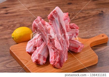 Note: This is uncooked raw meat and meat products. Pork spare ribs, pork belly on the bone, and BBQ meat. Note: This is uncooked raw meat and meat products. Pork spare ribs, pork belly on the bone, and BBQ meat. 136431181