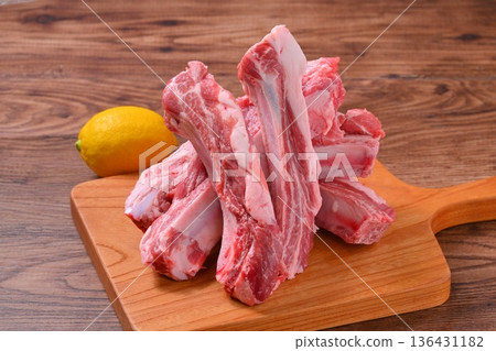 Note: This is uncooked raw meat and meat products. Pork spare ribs, pork belly on the bone, and BBQ meat. Note: This is uncooked raw meat and meat products. Pork spare ribs, pork belly on the bone, and BBQ meat. 136431182