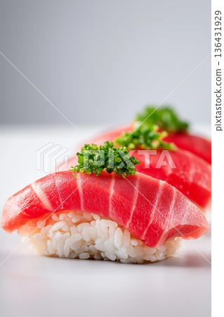 Fresh tuna nigiri sushi serving with green onion. Three pieces of fresh tuna nigiri sushi on a minimal white background 136431929
