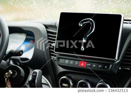 Question mark symbol drawn on car dashboard screen Question mark symbol drawn on car dashboard screen 136432513