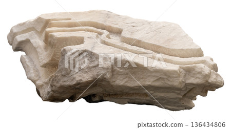 This cut out object shows a rock sculpture with layered lines. It displays the natural shape of stone formed by geological processes. The design highlights the texture of the material 136434806