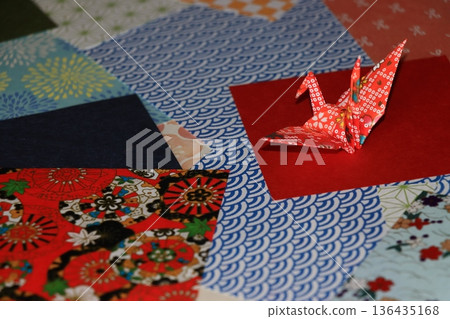 Folded paper crane 136435168