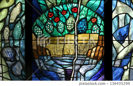 Stained glass window by Sieger Koder in Chapel in the Jesuit cemetery in Pullach, Germany Stained glass window by Sieger Koder in Chapel in the Jesuit cemetery in Pullach, Germany 136435299