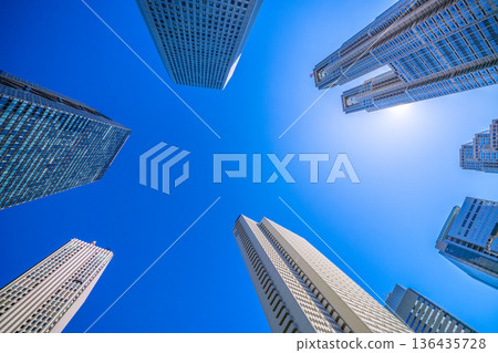Tokyo cityscape in Japan: View of Shinjuku's office buildings and Tokyo Metropolitan Government Building. Towards a new era = February 9, 2026 Tokyo cityscape in Japan: View of Shinjuku's office buildings and Tokyo Metropolitan Government Building. Towards a new era = February 9, 2026 136435728