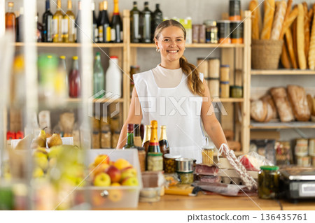 Woman seller with food set in grocery store 136435761