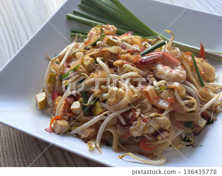 Pad Thai, the classic Thai stir-fried noodle dish. Pad Thai, the classic Thai stir-fried noodle dish. 136435778
