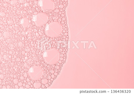 The texture of the foam of shower gel or soap suds or shaving foam. Macrophotography. Copy space The texture of the foam of shower gel or soap suds or shaving foam. Macrophotography. Copy space 136436320