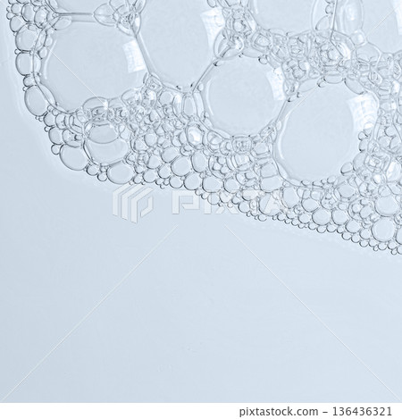The texture of the foam of shower gel or soap suds or shaving foam. Macrophotography. Copy space 136436321