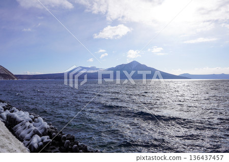 Mount Tarumae and Mount Fuppushi seen from a parking area along Lake Shikotsu 136437457