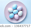 Easter traditions. Easter eggs in pastel colors in ceramic plate. Top view. Isolate on a white background. 136437717