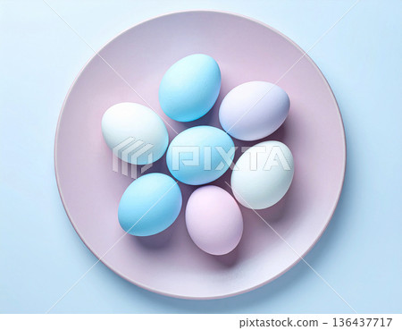 Easter traditions. Easter eggs in pastel colors in ceramic plate. Top view. Isolate on a white background. 136437717