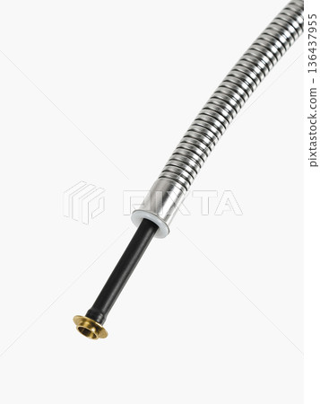 Shower hose is insulated on a white background. Close-up. Shower hose is insulated on a white background. Close-up. 136437955