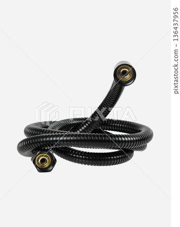 Black shower hose is insulated on a white background. Black shower hose is insulated on a white background. 136437956