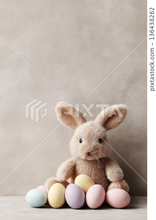 Rabbit sitting beside natural Easter eggs with copy space. Easter wallpaper. Rabbit sitting next to natural eggs, creating a minimal Easter holiday concept Rabbit sitting beside natural Easter eggs with copy space. Easter wallpaper. Rabbit sitting next to natural eggs, creating a minimal Easter holiday concept 136438262