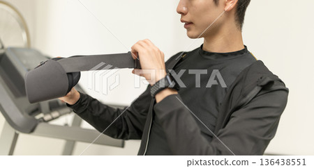 A man wearing a VR headset A man wearing a VR headset 136438551