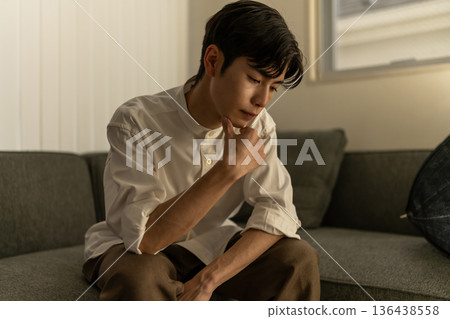 Man thinking deeply Man thinking deeply 136438558