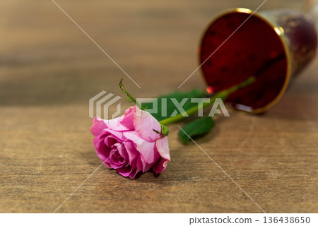 Lying pink roses and Venetian glass 136438650