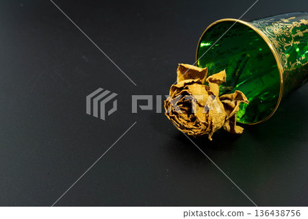 Lying dried rose flower Lying dried rose flower 136438756