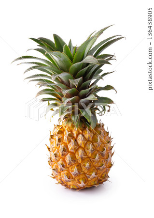 Ripe pineapple fruits isolated on a white background 136438905